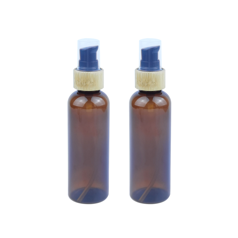RB-B-00322 lege skincare ferpakking 60ml 100ml amber plestik lotion flessen mei bamboe dispenser pomp