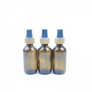 RB-B-00339 alam 1oz 2oz botol minyak tubuh minyak esensial boston botol minyak rambut kaca kosmetik bulat dengan pompa lotion bambu
