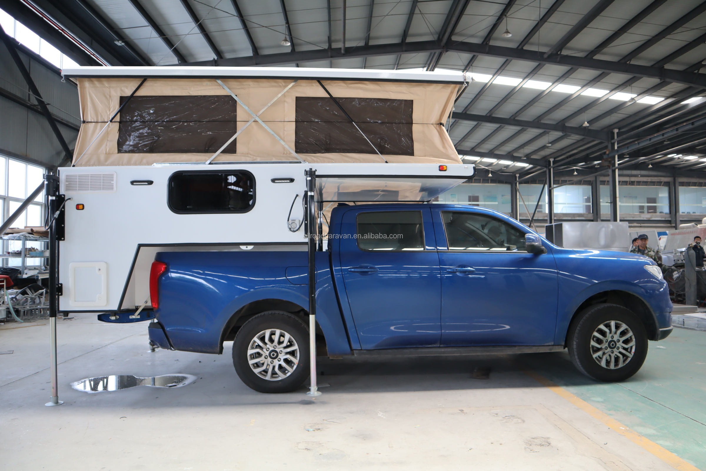 Pickup truck slide in camper pop top caravan with low power consumption