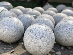 outdoor landscaping sculpture white grey marble sphere