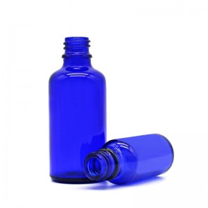 Blue essential oil bottle with dropper