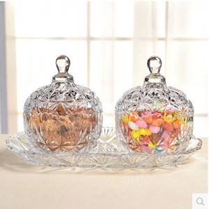 A glass candy jar of amber and clear colors for your choice in stock