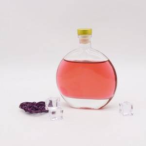 Oblate glass liquor bottle with Synthetic Stopper