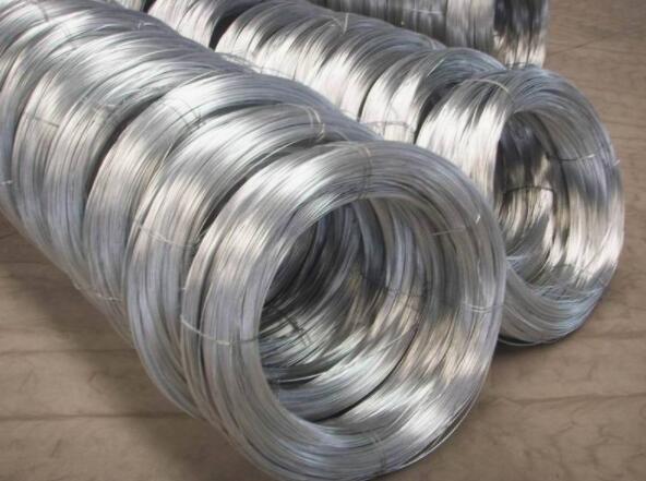 Why should surface carburizing of titanium alloy wire be carried out?