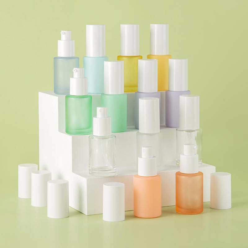 Custom 1oz Essential Oil Skincare Glass Pump Bottles with White Caps