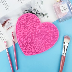 Qalb Forma tas-silikonju Makeup Mat Suction Cup Xkupilji Tindif Pad