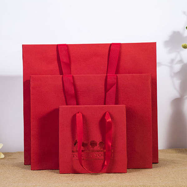 Is it feasible to replace plastic bags with paper bags from Guangzhou Spring Package?