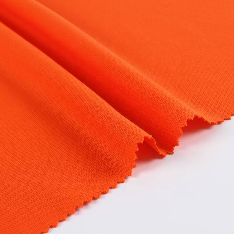sumber apik polos dicelup oranye rajutan 100 polyester mripat manuk bolong kain