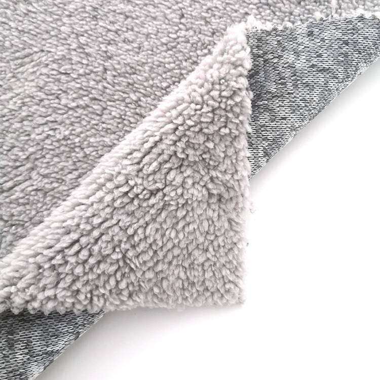 Tissu de pull hacci en tricot de polyester 100 doux au toucher à la main, tissu polaire sherpa collé à vendre