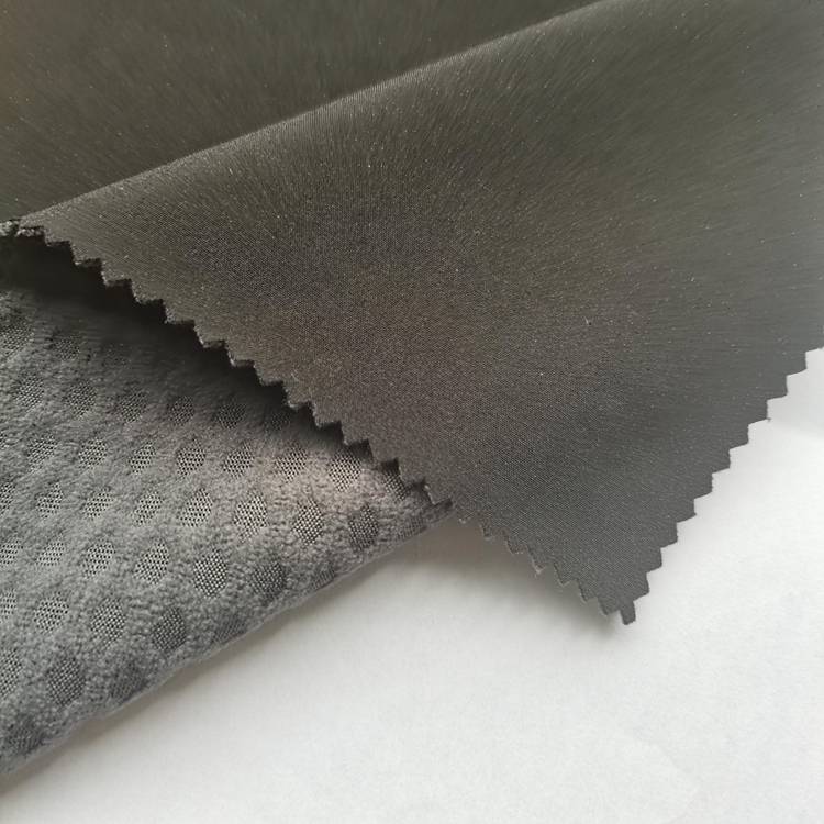 Hot selling 4 ways stretch polyester spandex bonding jacquard knitted polar fleece bonded fabric for clothes