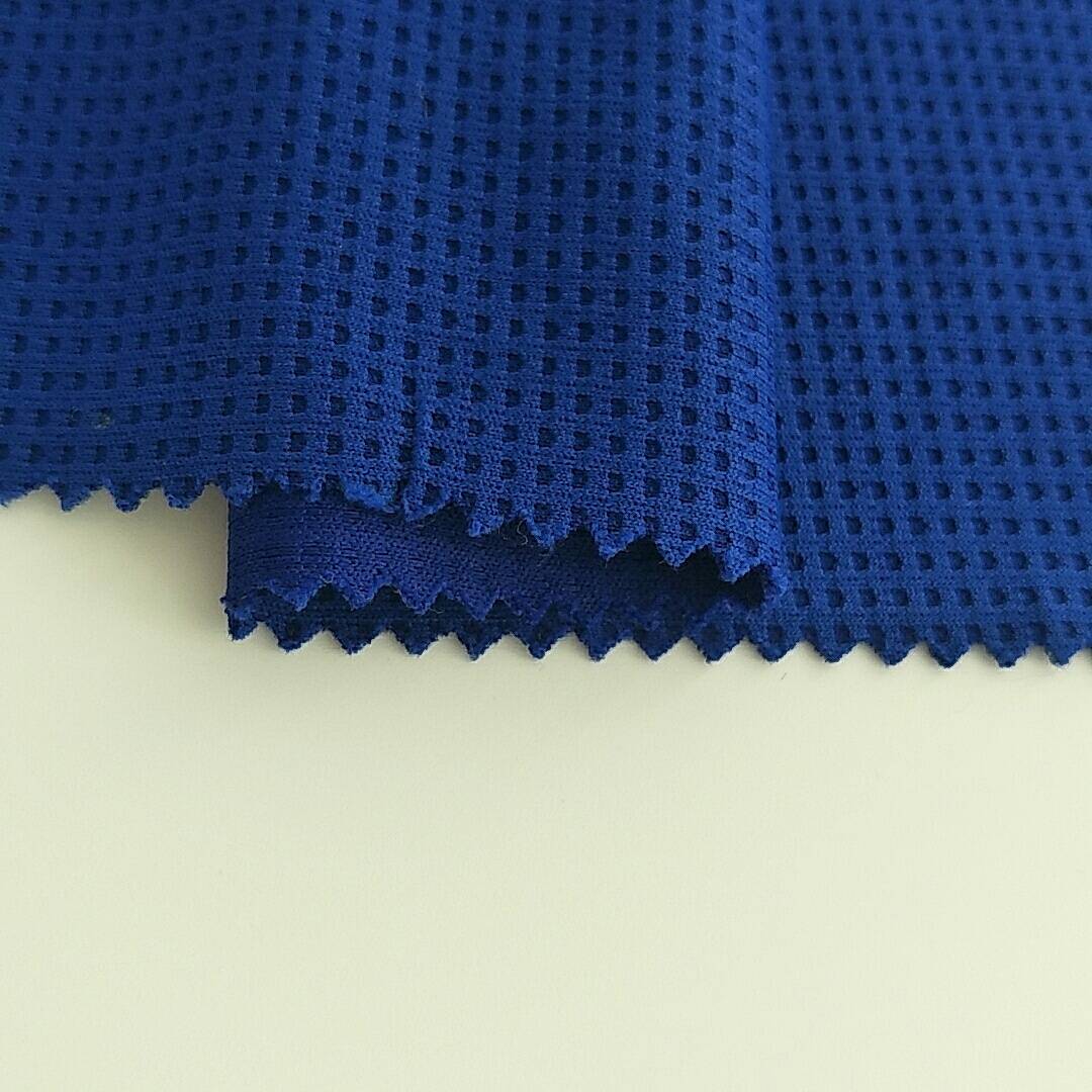 ក្រុមហ៊ុនផលិតរបស់ប្រទេសចិន 100% polyester walf mesh fabric សម្រាប់សម្លៀកបំពាក់កីឡា