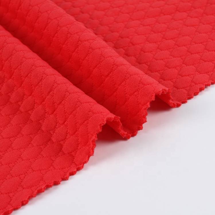 kinesisk röd vanlig färgad polyester spandex jacquard stickat tyg för plagg