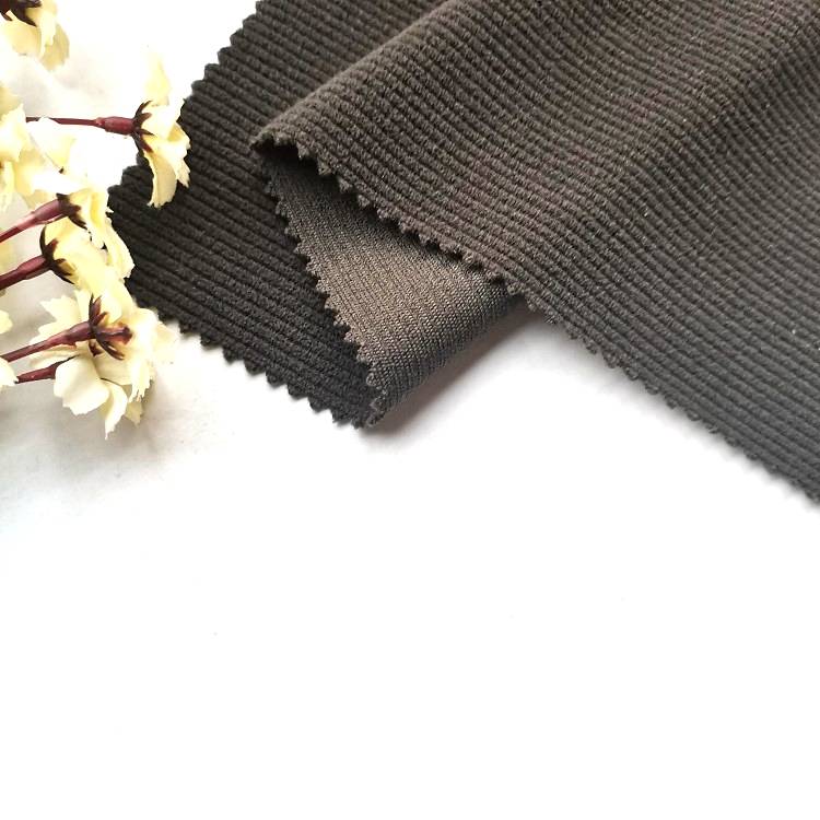 Hot selling 100 polyester anti-pilling stickad raka ränder mönster polar fleece tyg