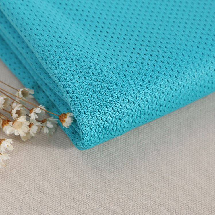 Polyester chaîne tricotée maille fine tissu tricoté en oeil d'oiseau chemise de sport de printemps et d'été T-shirt tissu de robe de fitness maille