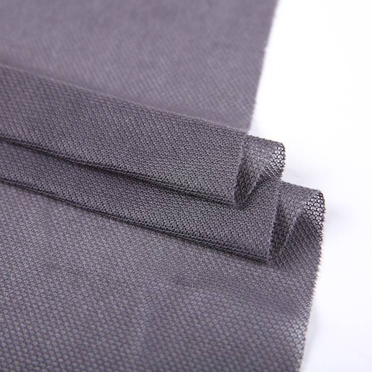 China Textil op Lager Warp gestréckte 100 Polyester Mesh Stoff fir Kleeder