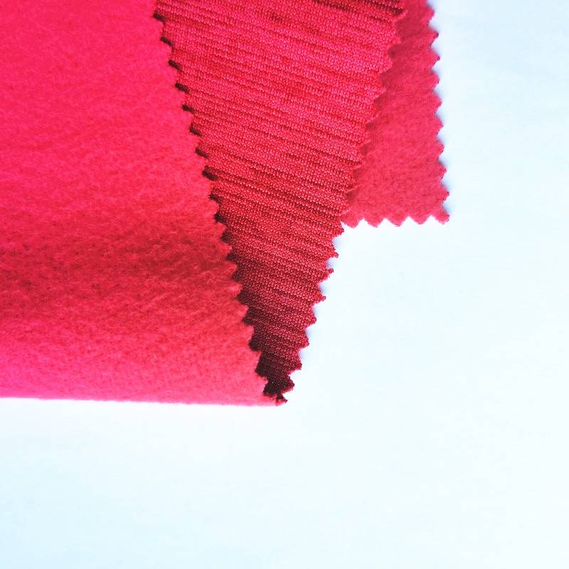 තොග විසිතුරු නිර්මාණය Knit Cationic Dye Poly Back Fleece Brush Fabric for jacket