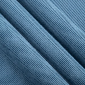 Tissu tricoté par nervure de tissu de spandex populaire couleur unie tissu tricoté fait sur commande de nervure de polyester de spandex pour le pull
