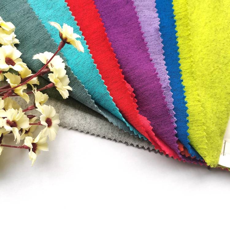 Tkanina od brušenog flisa od male grube igle boje breskve prilagođenih bojama za odjeću