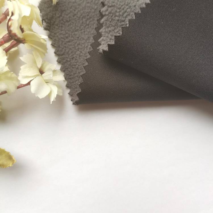 परिधान के लिए ध्रुवीय ऊन बंधुआ कपड़े के साथ बुना हुआ नया डिजाइन 100 पॉलिएस्टर ठोस रंग इंटरलॉक