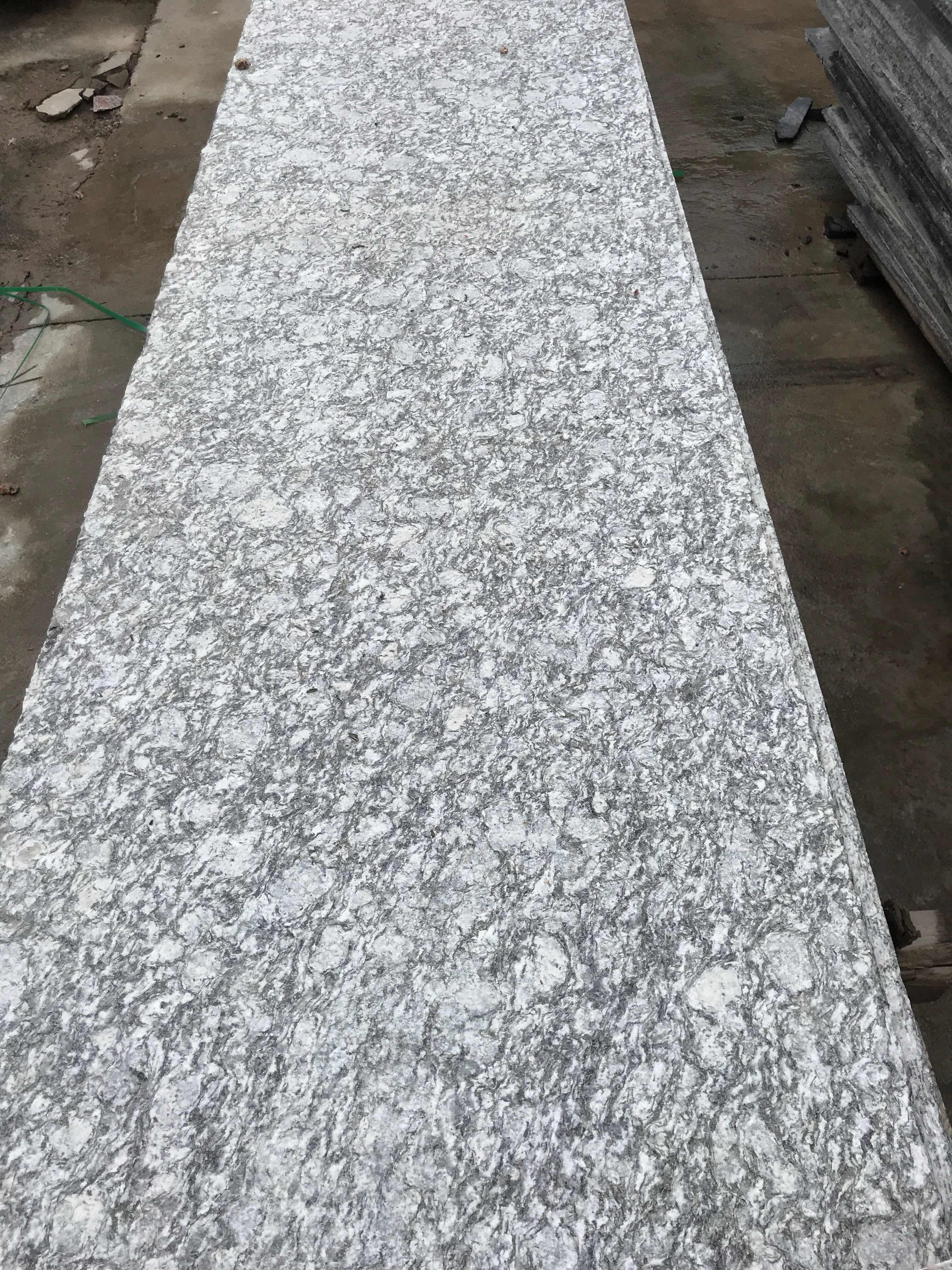 Spray white granite