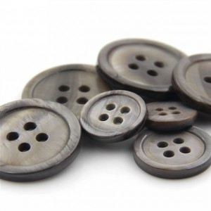 Manufacturer of China Wb115 Spare Parts White Iron Wear Buttons for Bucket