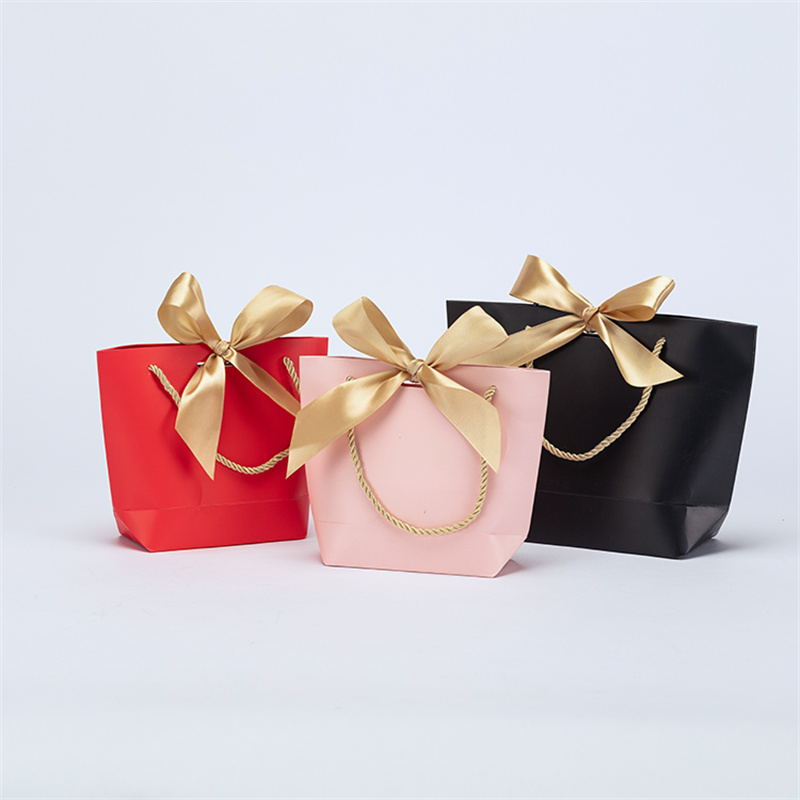 Bow Ribbon Round Rope Hand Held Art Paper Bag Featured Image