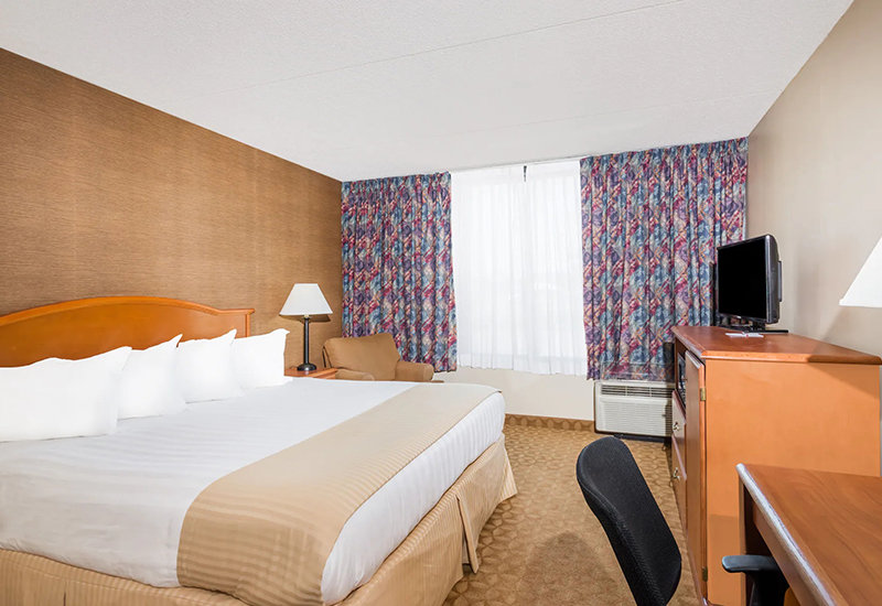 Ramada Wyndham hotel bedroom set Featured Image