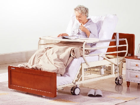 What conveniences does the multi-functional nursing bed in elderly care furniture bring to the elderly who care for themselves at home?