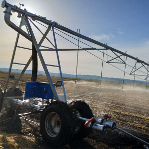 Lateral move irrigation system for farms