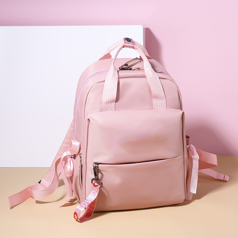 2019 Latest Design Fashion Nylon Women Handbags - 2022 Lovely Pink Bowknot Custom Kids School Bag Factory Anti-Theft Oxford Student Backpack – Tongxing