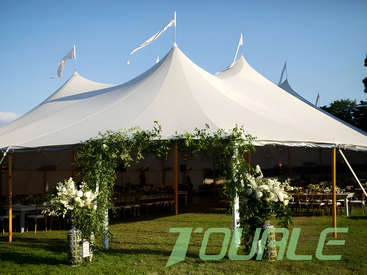 The Charm of Wooden Pole Wedding Tents