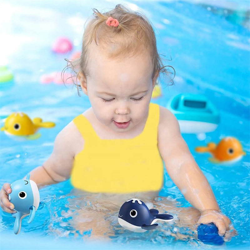 China Magnet baby bath fishing toys wind-up swimming whales