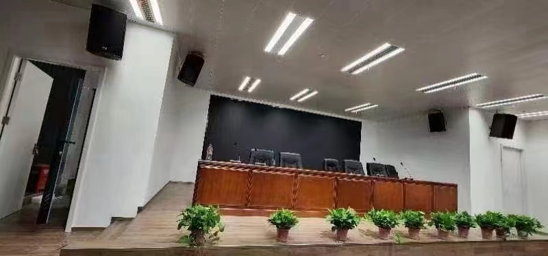 How can I avoid audio interference with the conference room sound syste