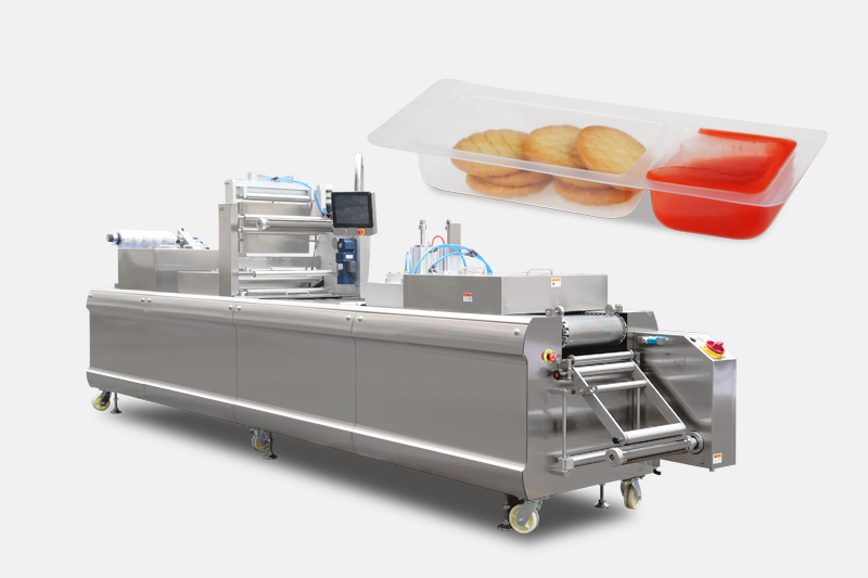Biscuit thermoforming packaging machine
