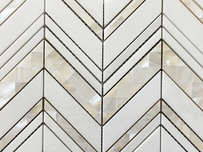 White Thassos marble with seashell inlay mosaic tile backsplash