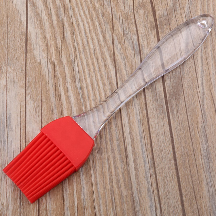 HUBERT® Red Silicone Pastry Brush with Black Plastic Handle - 8 1/4L x 1  7/10W