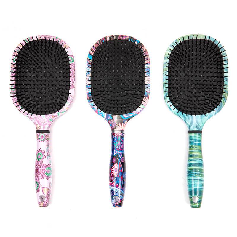 Rubber coating, water transfer, UV electric paddle hair brush with flexible cushion Featured Image
