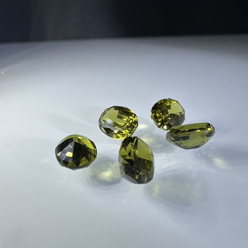 Safiro verda por gemoj olivverda artefarita 99,999% Al2O3 sinteza