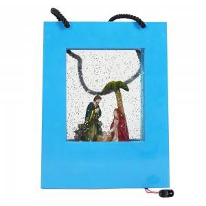 Hot sell plastic hand gift bag design nativity sence Christmas musical Led water spinning glitter snow globe