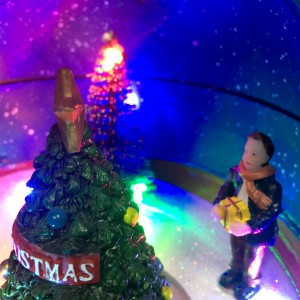 Plastic LED light up noel seasonal ornament, tabletop decor animated musical Xmas scene Green Santa Snowball