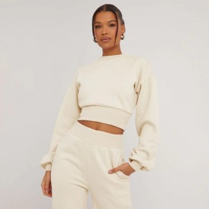 LONG SLEEVE ELASTICATED WAIST DETAIL CROPPED SWEATER IN CREAM