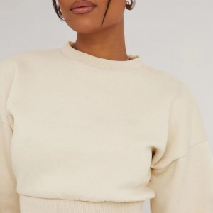 LONG SLEEVE ELASTICATED WAIST DETAIL CROPPED SWEATER IN CREAM