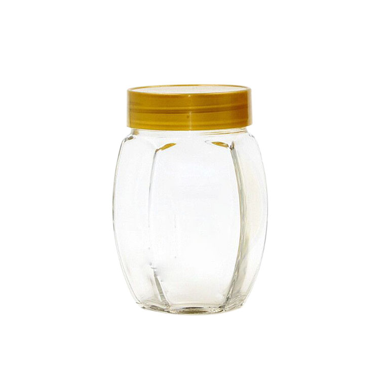 Popular big belly honey bottle glass hexagon honey jar with aluminum lid Featured Image
