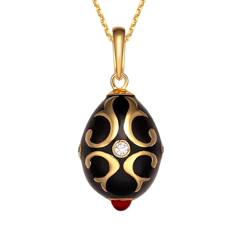 Vintage black gold enamel egg pendant with crystal