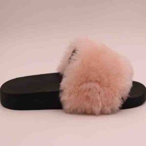Fashion ladies’ slippers with natural suede and PVC sole with non-slip material