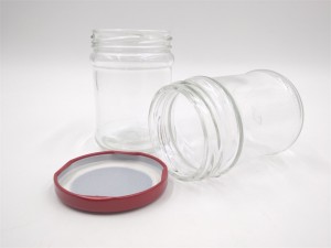 China factory hot-sale 150ml empty round glass jar transparent glass jar custom logo capacity with lid
