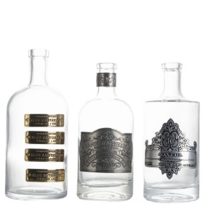 wholesale empty 500ml 750ml embossed Metallic label glass bottle Vodka glass bottle vodka rum gin bottles custom logo