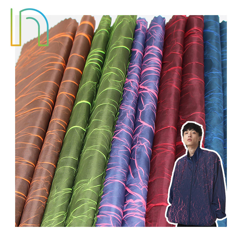 100% Polyester wonderful color effect new magic fission stretch 100% polyester fabric Featured Image