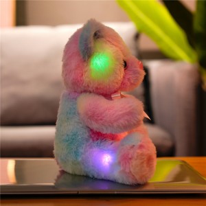 O volume ilumina acima o brinquedo de pelúcia do urso de peluche que brilha brinquedos macios luminosos do urso para crianças