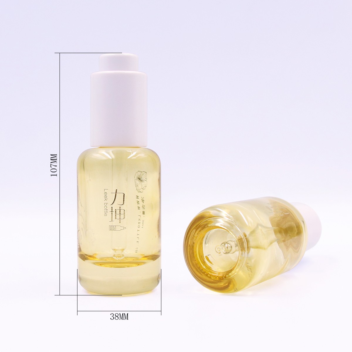 30ml Essence press-down glass bottle with smooth rounded shoulders
